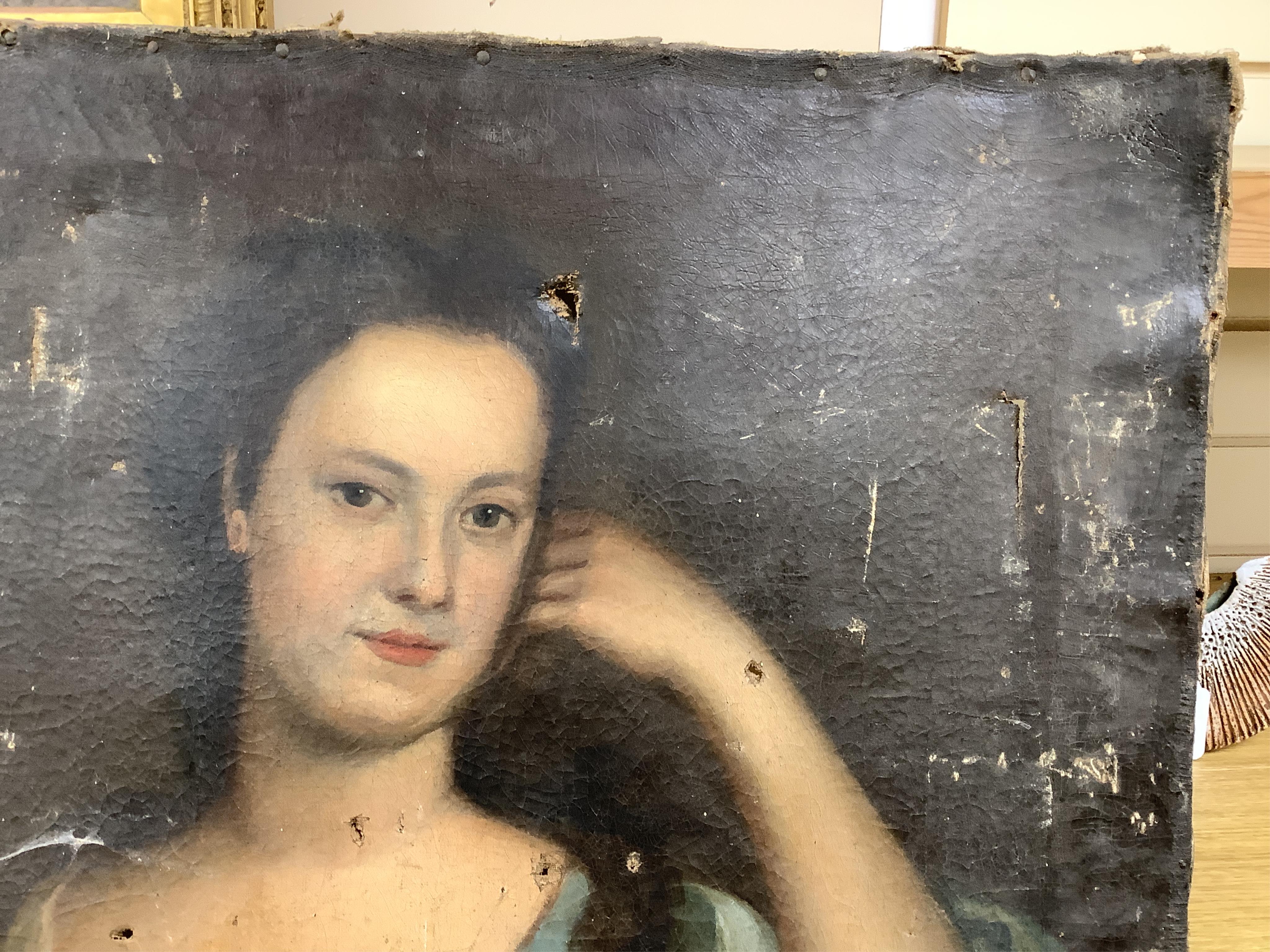 Manner of Michael Dahl (Swedish, 1659-1743), oil on canvas, portrait of a lady, unframed, holes to canvas, a.f, 76 x 65cm